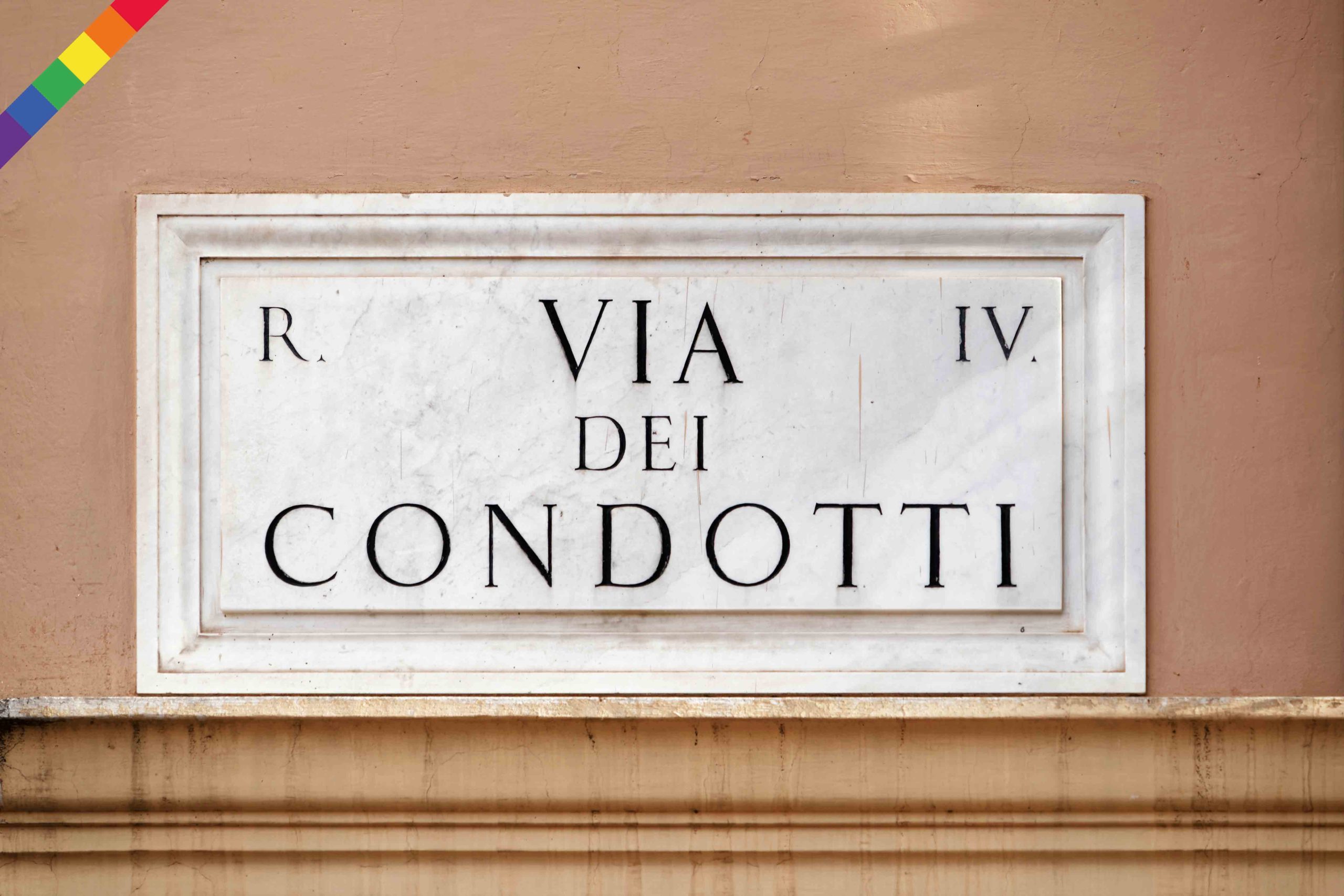Via dei Condotti street sign on the wall in Rome, Italy