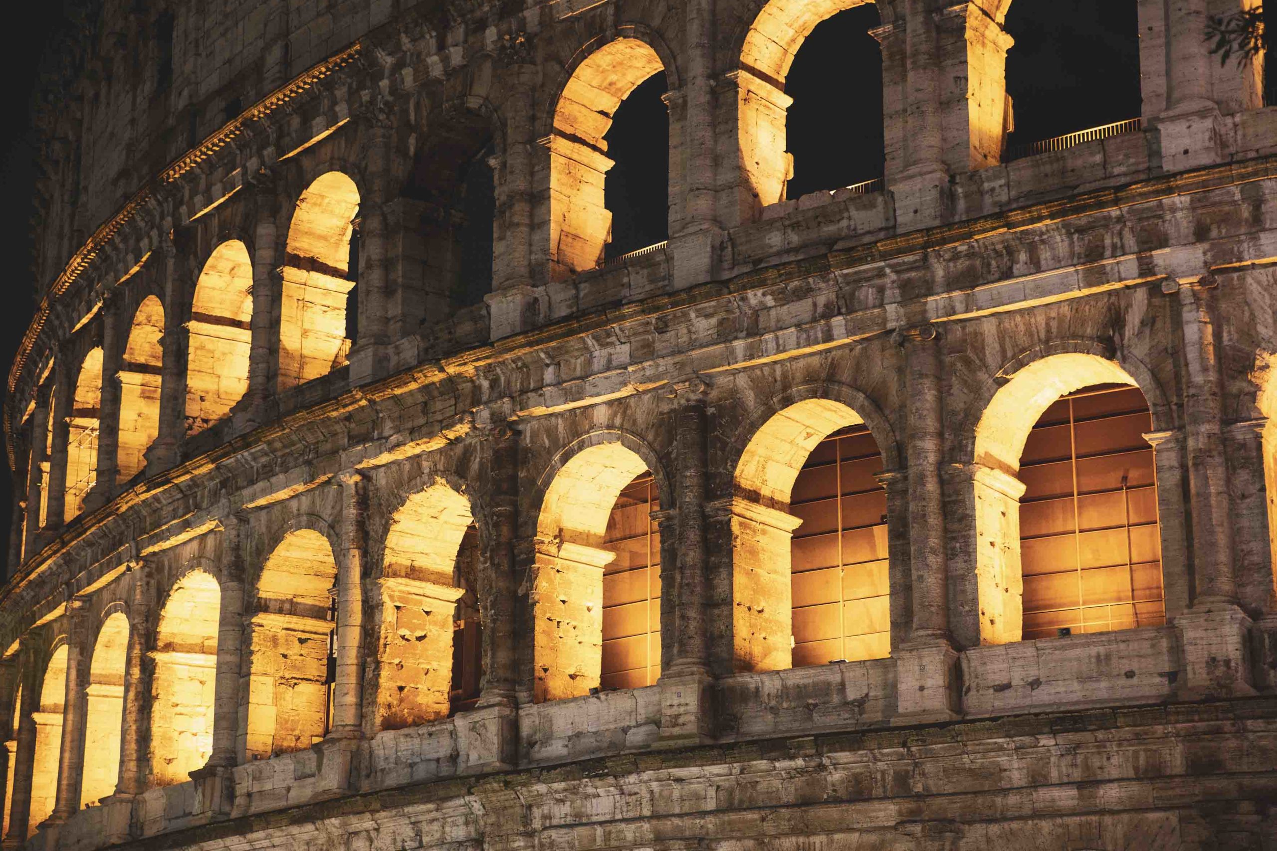 Roma, Italy, 24/11/2019: Night photo of the ancient Colosseum of Rome located in the city center, travel reports